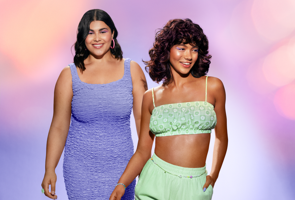 two models in front of a colorful background