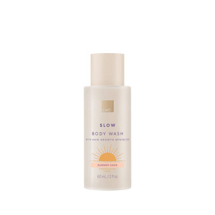 Body wash bottle labeled 'Slow' with 'Summer Oasis' scent on a white background