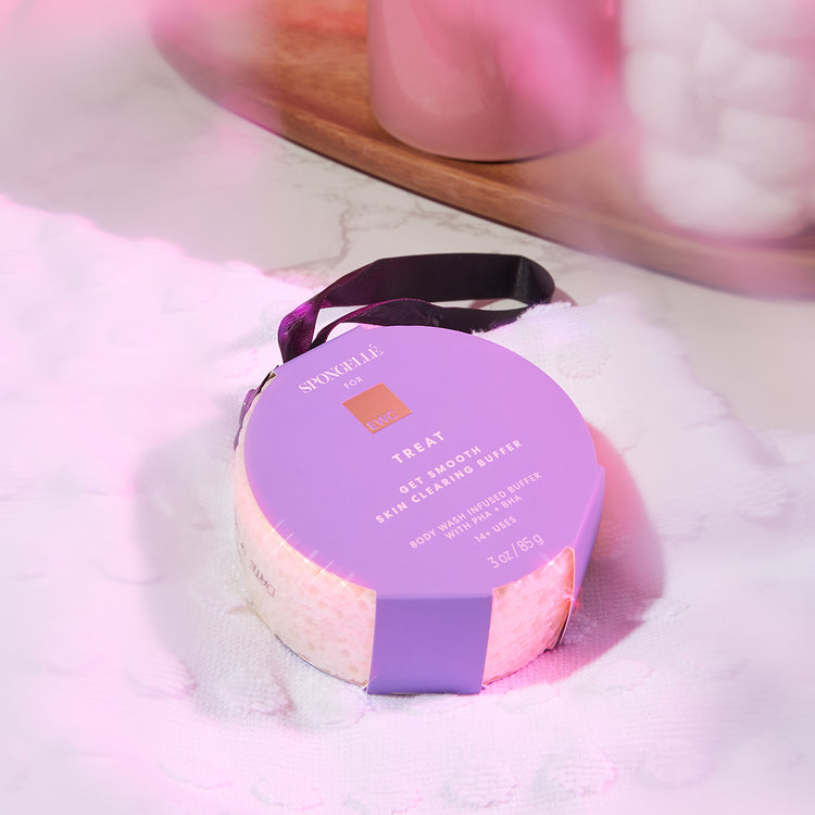 Spongellé for EWC Get Smooth Body Buffer resting in a bathroom counter