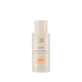 Body wash bottle labeled 'Slow' with 'Summer Oasis' scent on a white background