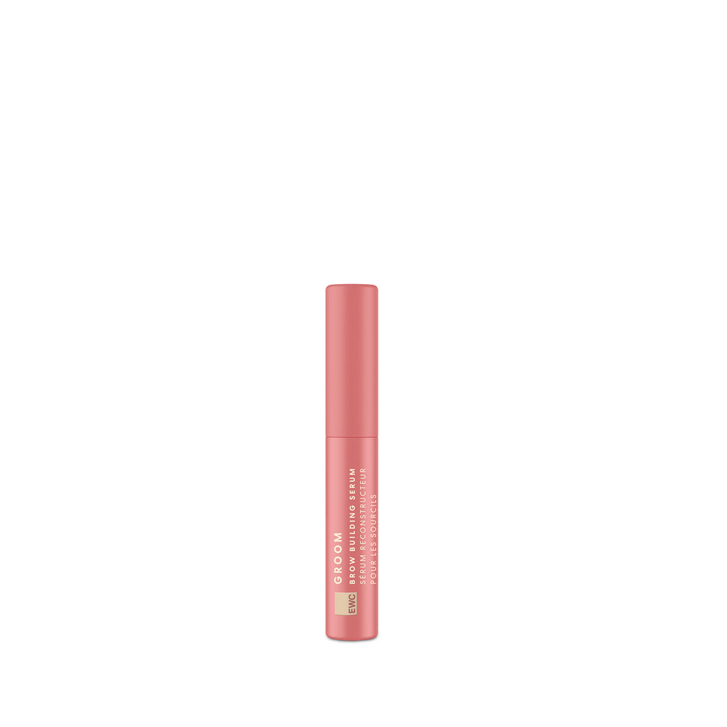 European Wax Center pink tube of Groom Brow Building Serum on white background